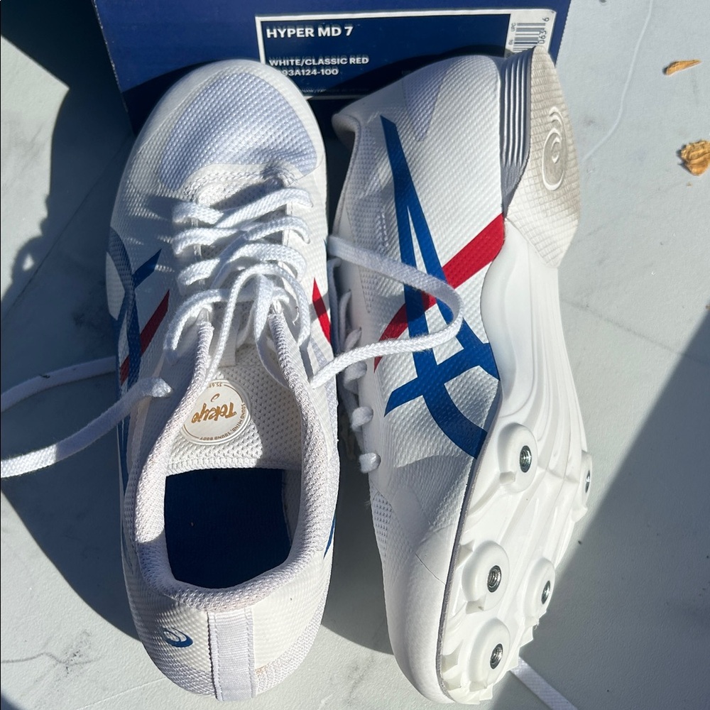 Asics White Track Shoes with Blue and Red Accents